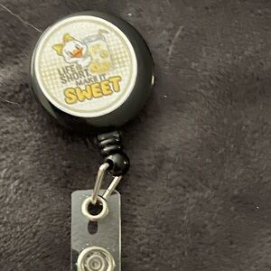 Black Badge Reel with Sweet Duck Design